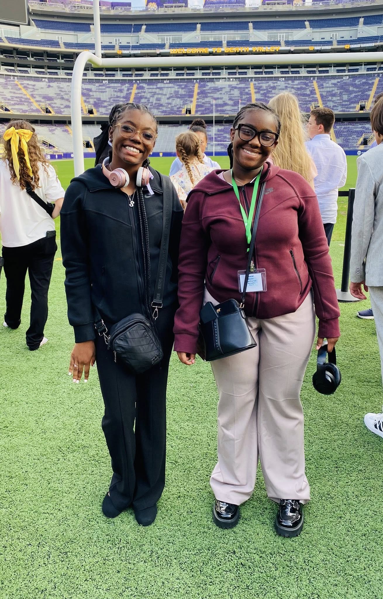 Two girls posing for a photo.